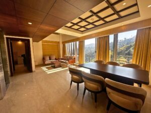 A picturesque view of Nirvana Woods in Shimla, offering 2 and 3 BHK apartments and 4 BHK villas starting from Rs. 19,600,000. Fastlane Realtors phone number 9811341333 are the preferred channel partners for the sale of the project